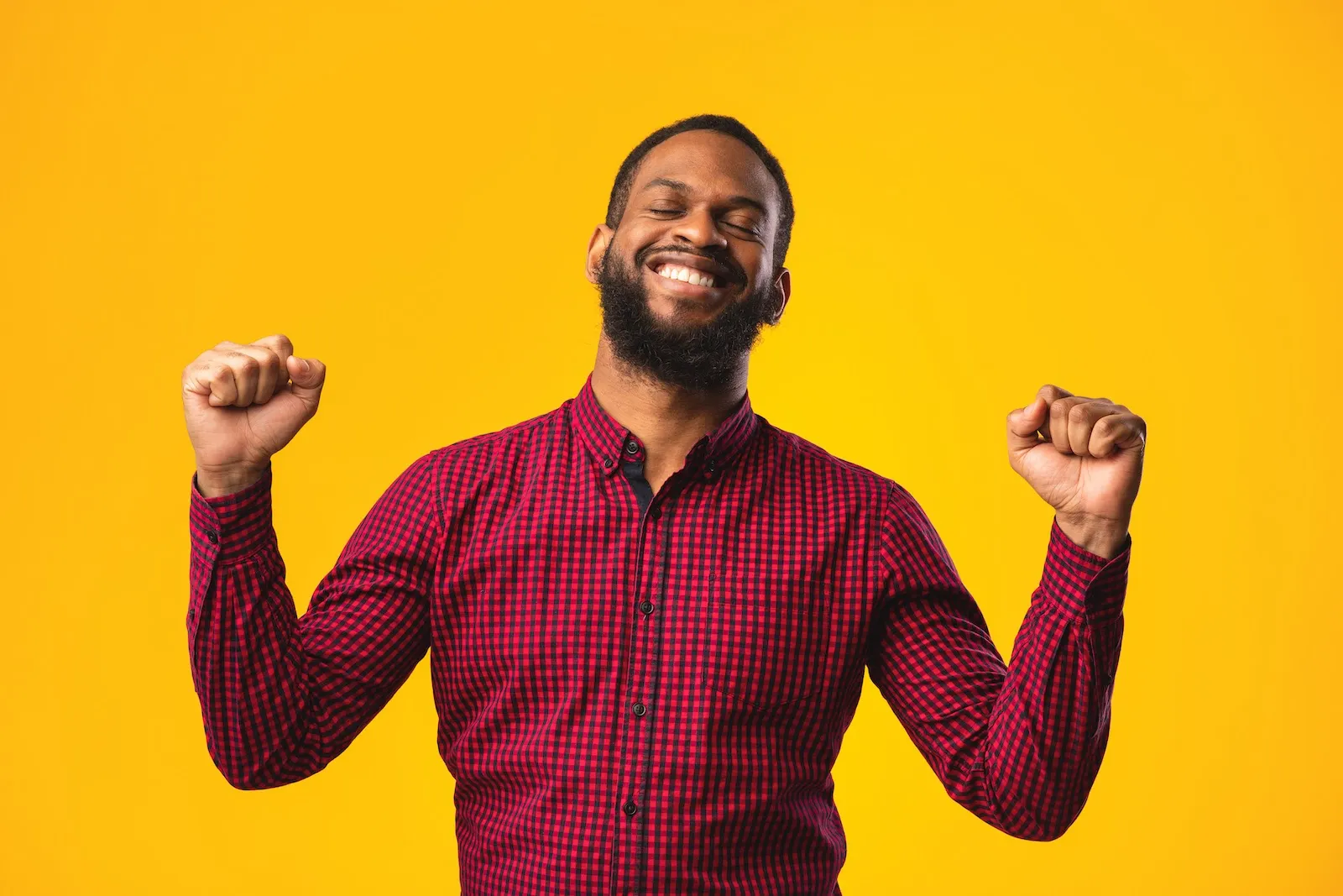 A team member is happy about peer-to-peer recognition office management software