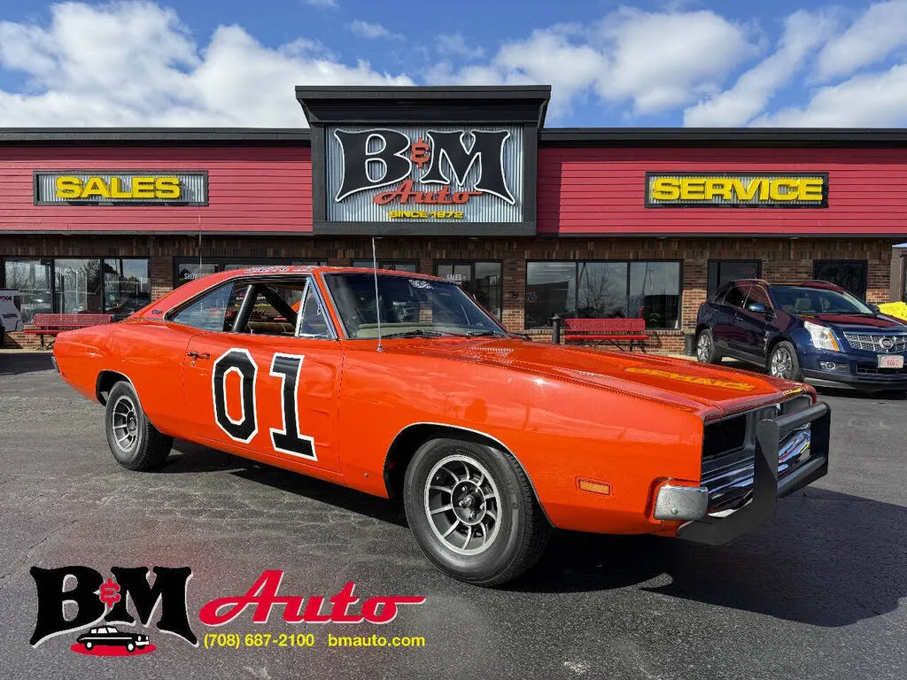 A well-maintained 1969 Dodge Charger with a brown exterior