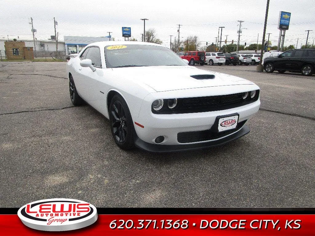 A white 2021 Dodge Challenger R/T parked in a lot.