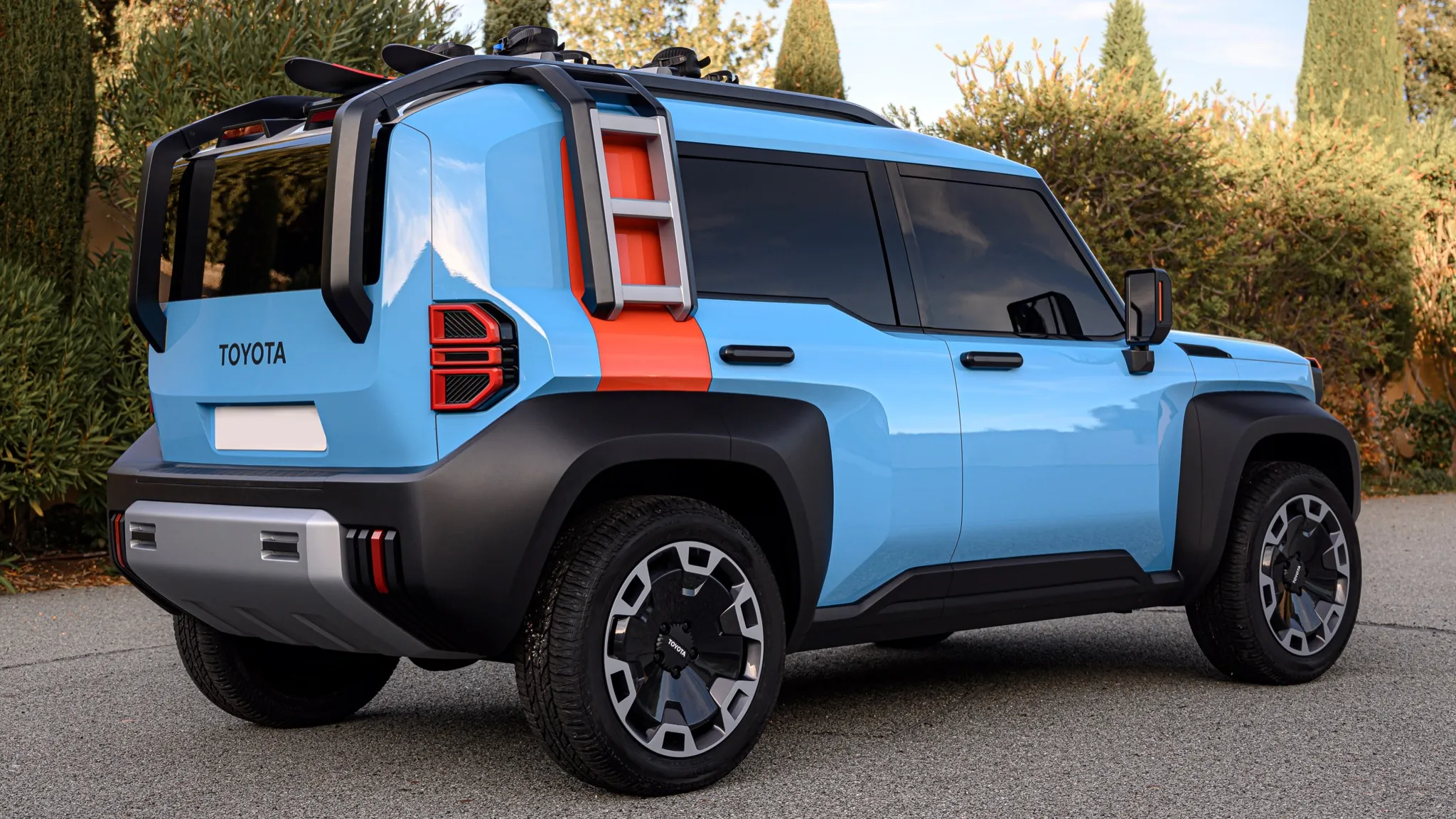 A white Toyota Compact Cruiser EV Concept with chunky tires in an outdoor setting