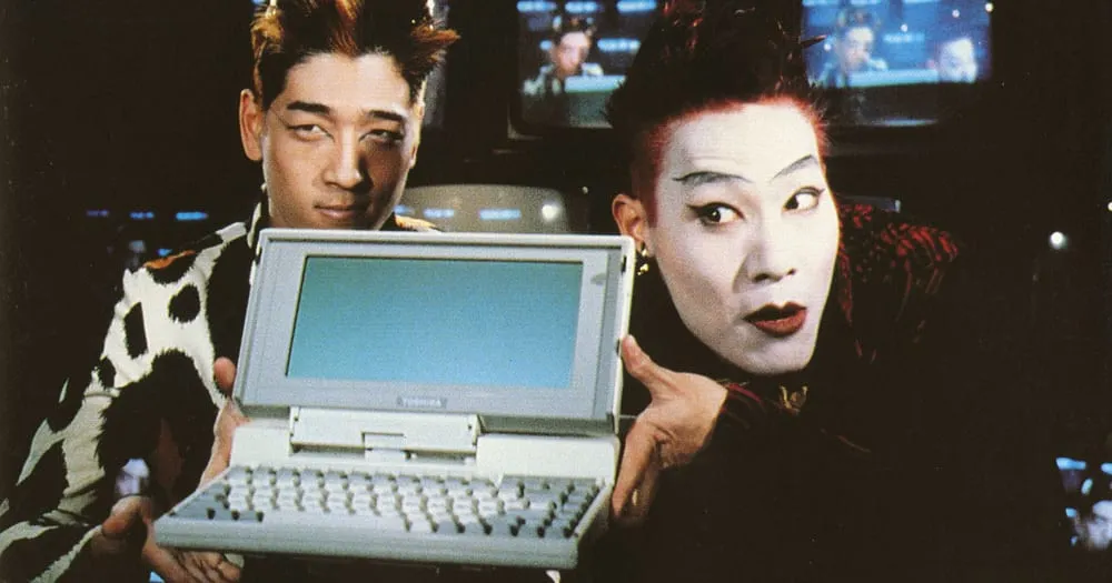 Acid Burn (Angelina Jolie) and her mentors in a nightclub setting from "Hackers" (1995)