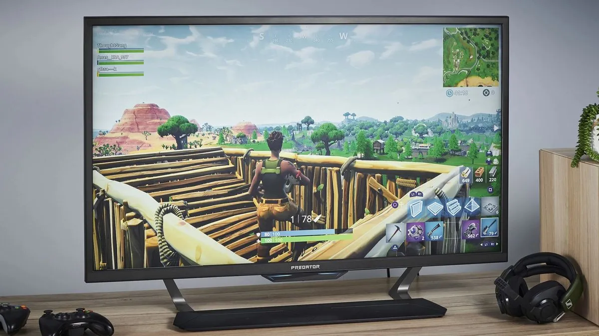 An Acer Predator CG7 monitor displaying dynamic in-game action on its large screen