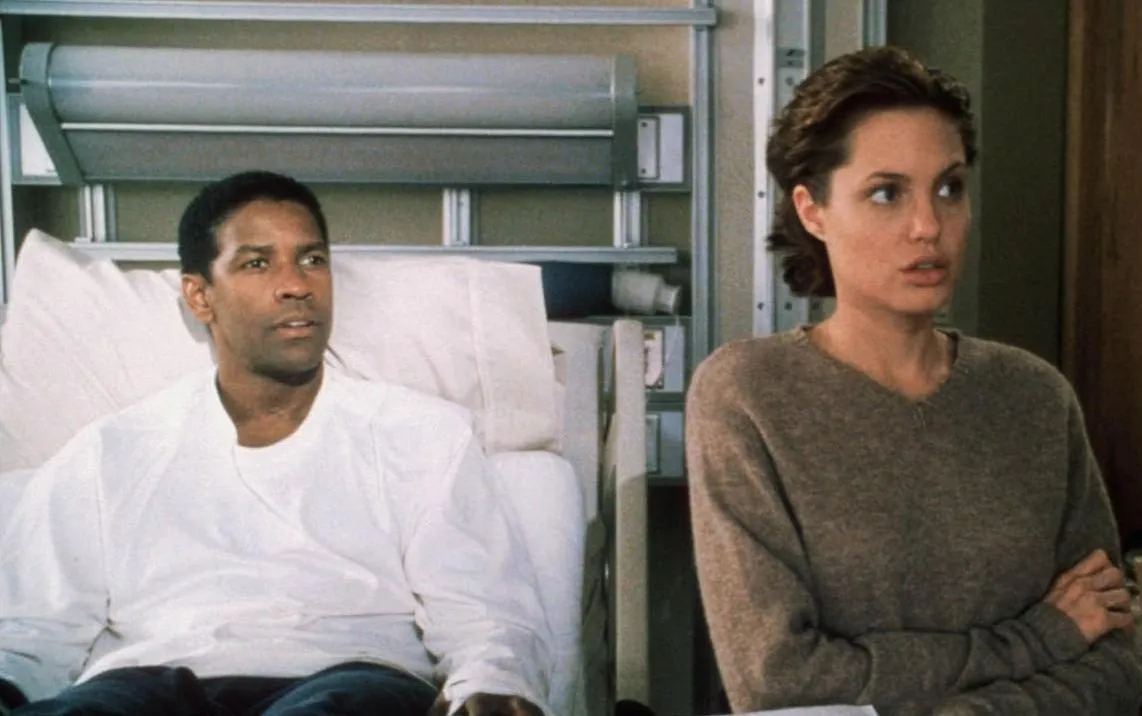 Angelina Jolie and Denzel Washington sharing a moment of intense connection