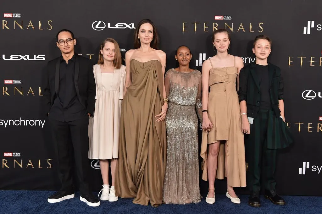 Angelina Jolie pictured with her children, including Shiloh, at a public event