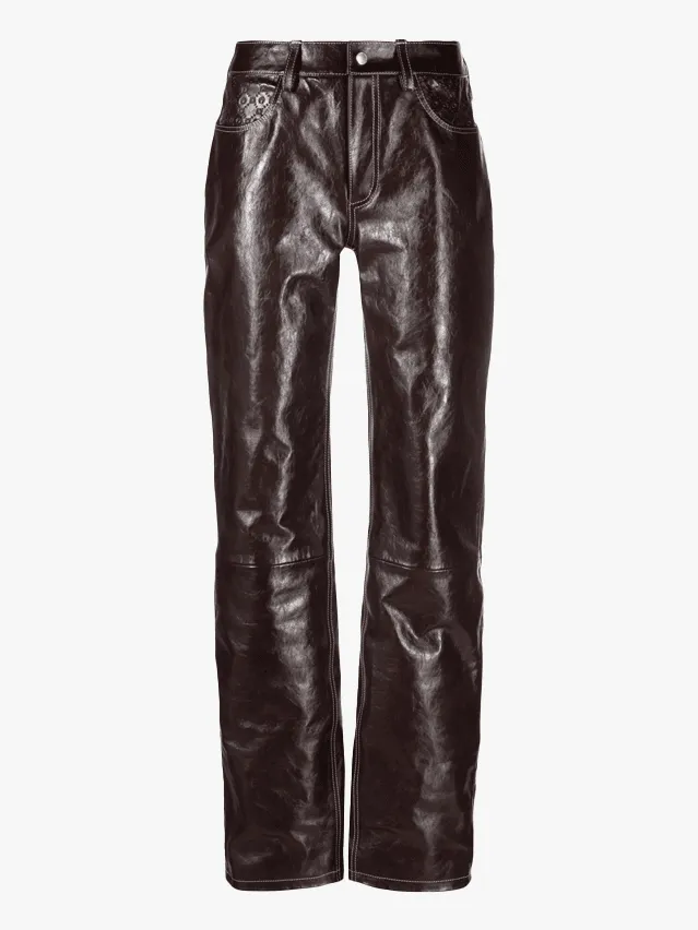 Angelina Jolie wearing leather trousers with a simple top in the 1990s