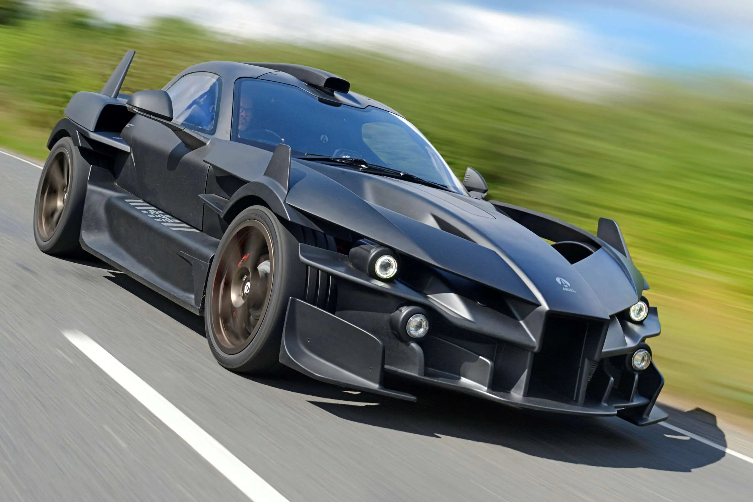 Ariel Hipercar electric supercar displaying its distinctive open-wheel-like design and advanced aerodynamic features