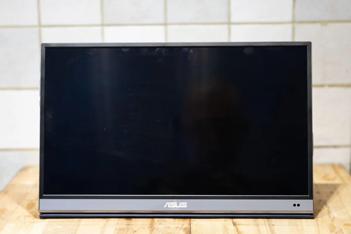 ASUS ZenScreen MQ16AH portable monitor on a desk