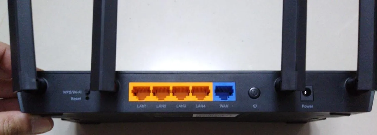 Back of a TP-Link AX1500 Wi-Fi 6 Router, highlighting its ports and design
