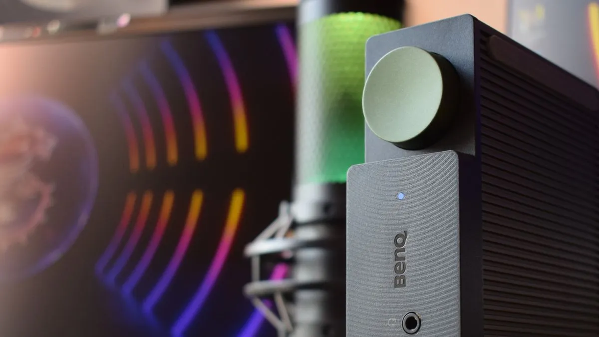 BenQ beCreatus Hybrid Docking Station with a prominent green button, indicating its unique multi-device functionality.