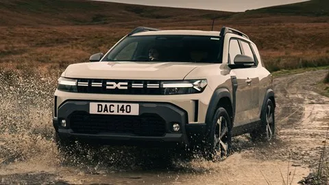 Best small hybrid cars: Dacia Duster - front, beige, driving
