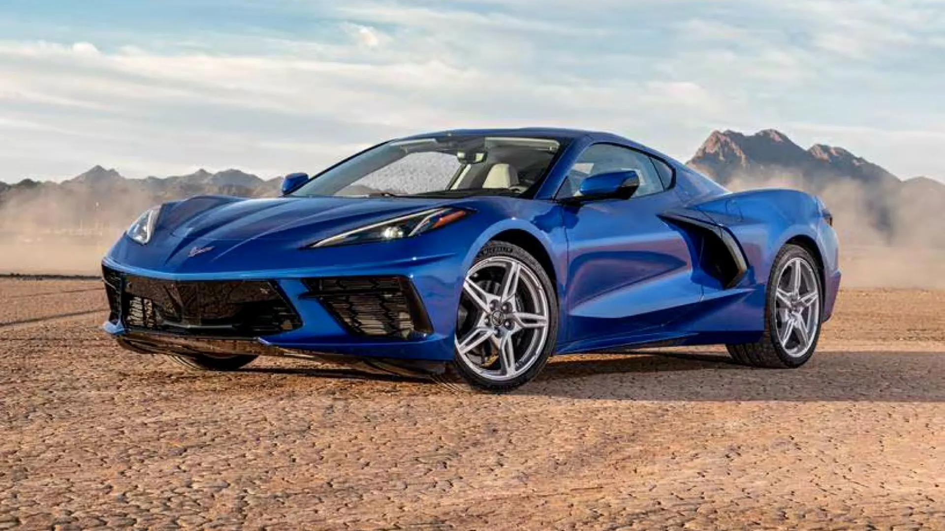 Blue 2023 Chevrolet Corvette Stingray C8 posing in a desert landscape
