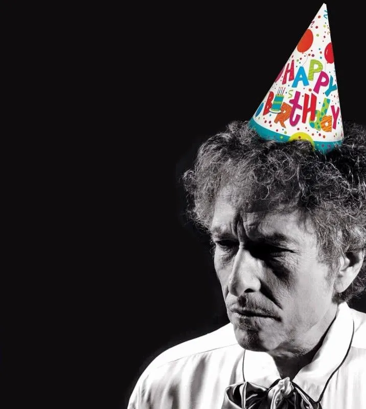 Bob Dylan performing live on stage, captivating the audience