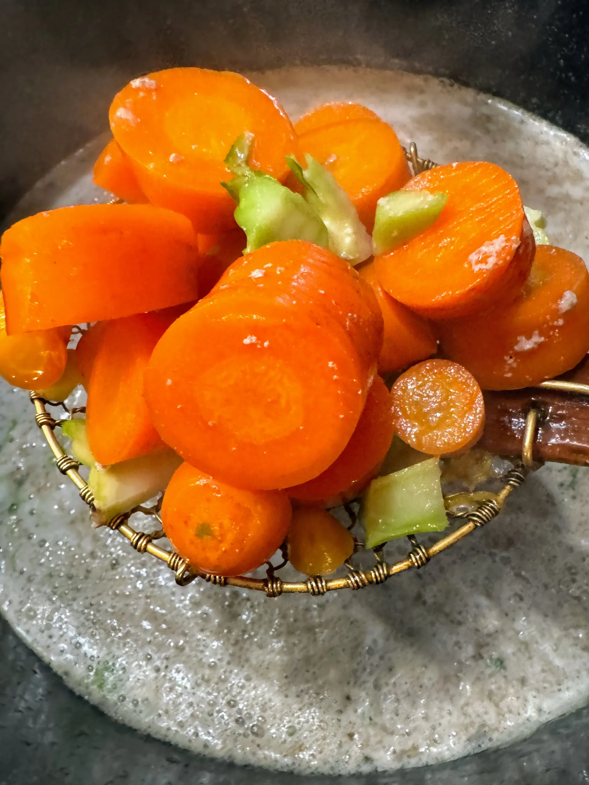 Bright orange carrots, low in calories and high in fiber and vitamins, are a favorite of dogs