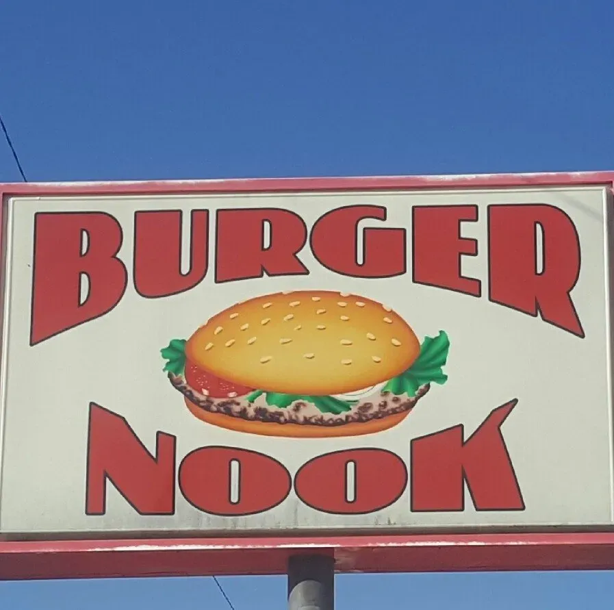 Burger Nook Café sign featuring a hamburger illustration
