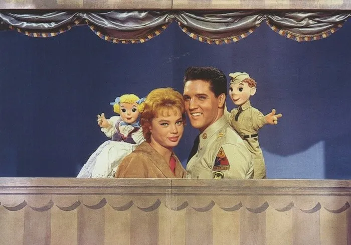 Candid photo of Elvis Presley on the G.I. Blues set