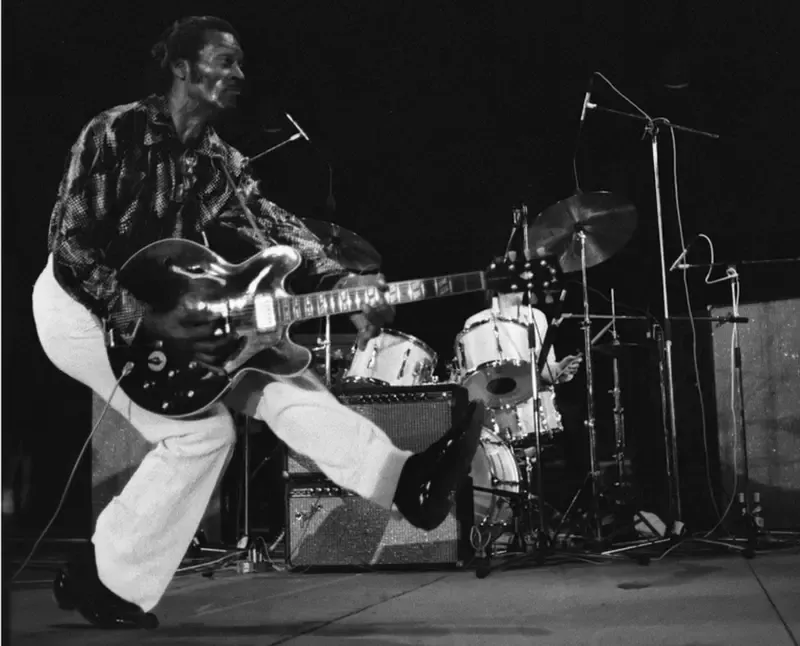 Chuck Berry performing his iconic guitar riffs in Vienne, France, on July 10, 1981.