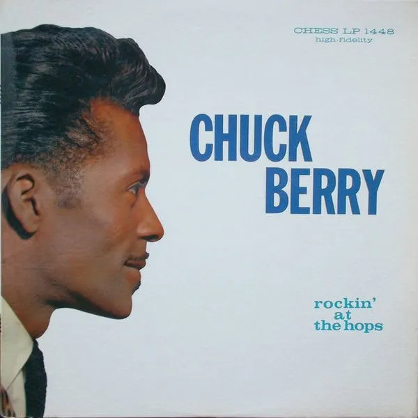 Chuck Berry performing on stage, playing his signature guitar