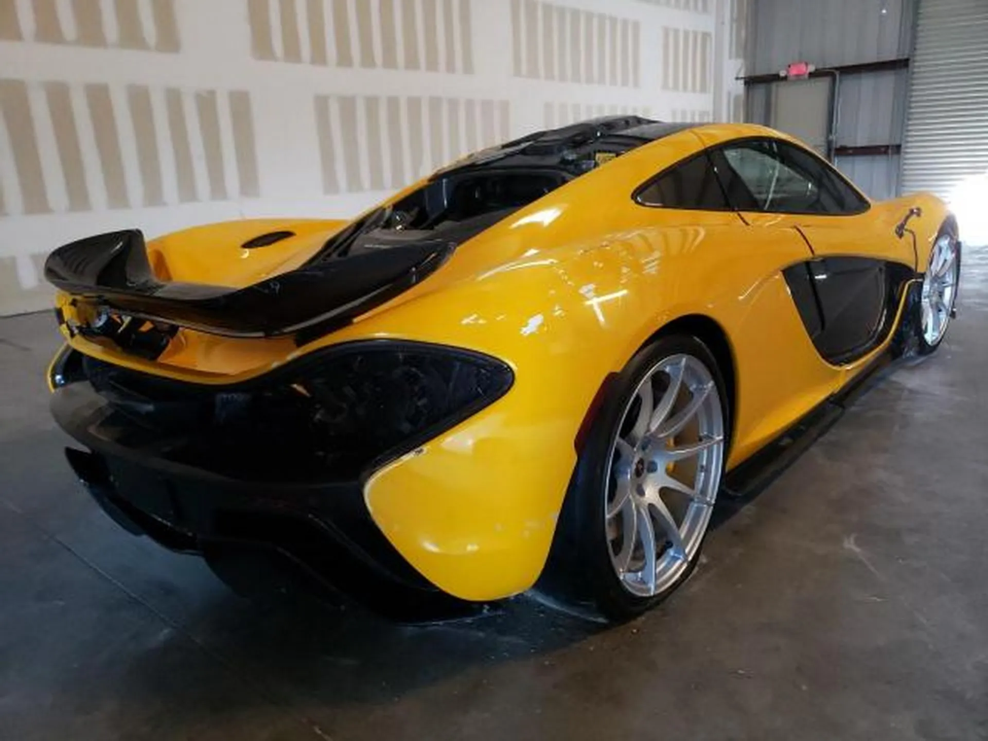 Close-up interior shot of the McLaren P1, revealing signs of extensive flood damage