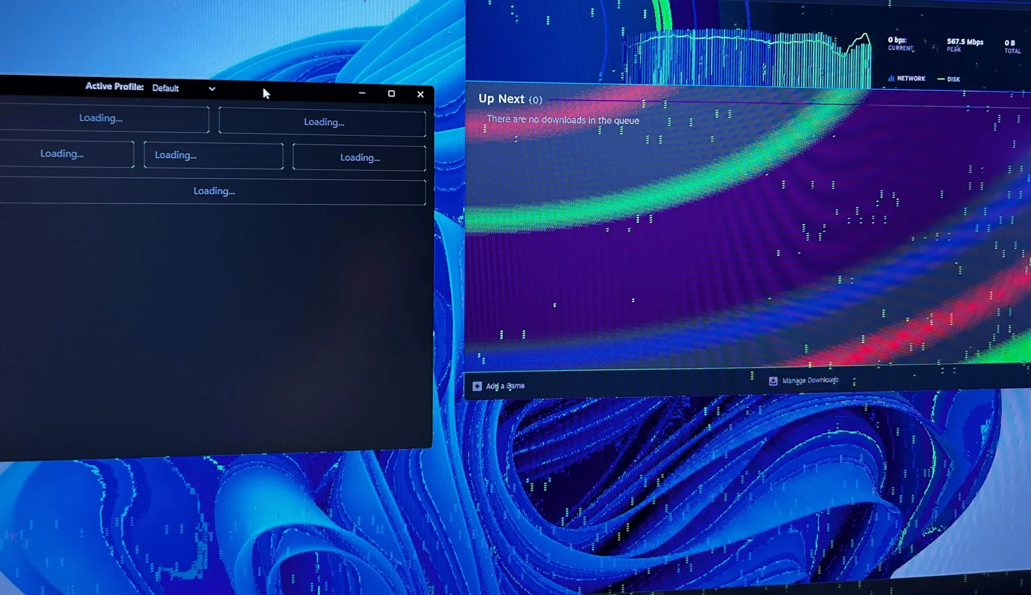 Close-up of a computer monitor displaying green visual glitches and squares due to GPU artifacting