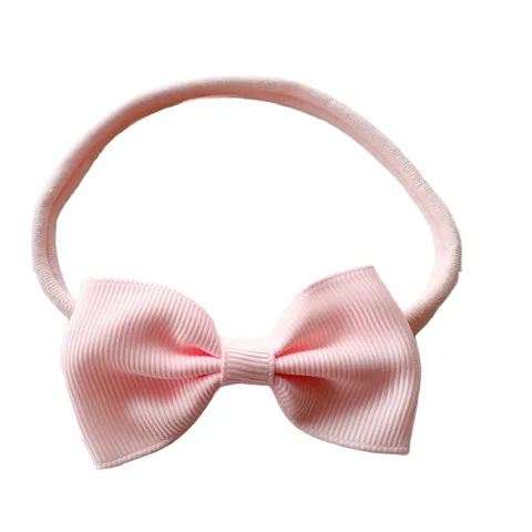 Close up of Sprinkle Pups Simply Cute Hairbow Headband on a dog