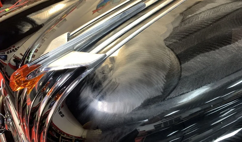 Close-up of the polishing process on the 1950 Pontiac Chieftain's paint.