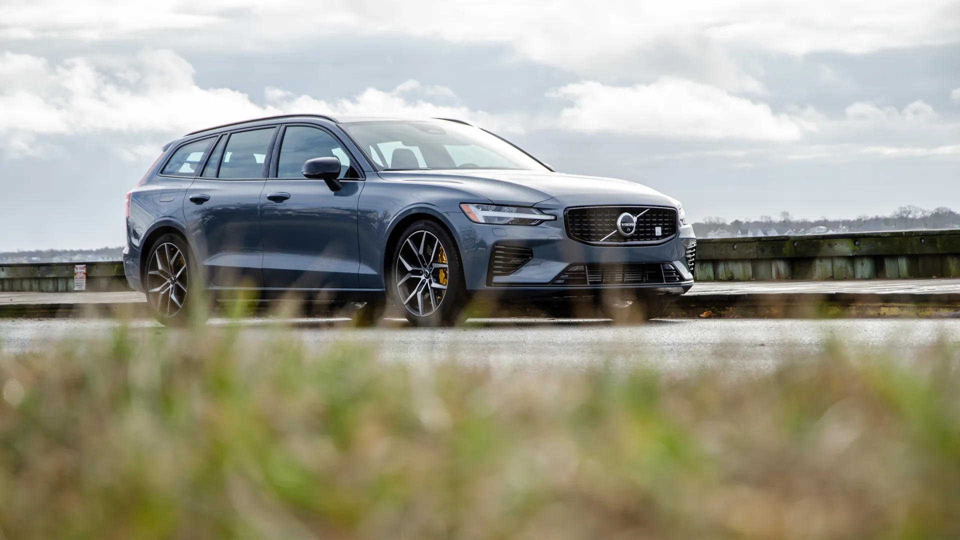 Close-up view of the Öhlins suspension adjustment knob visible under the hood of the V60 Recharge T8 Polestar