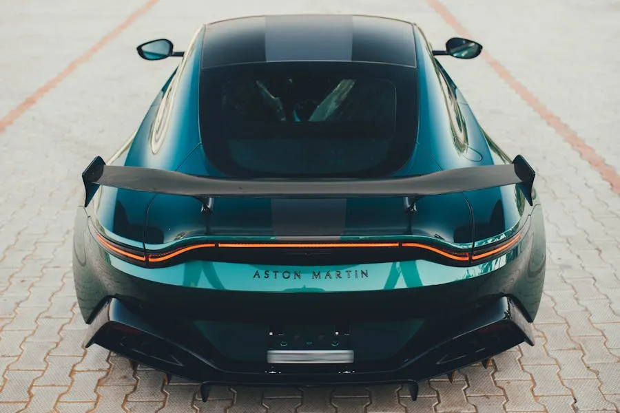 Collection of famous luxury car logos including McLaren, Ferrari, and Bentley