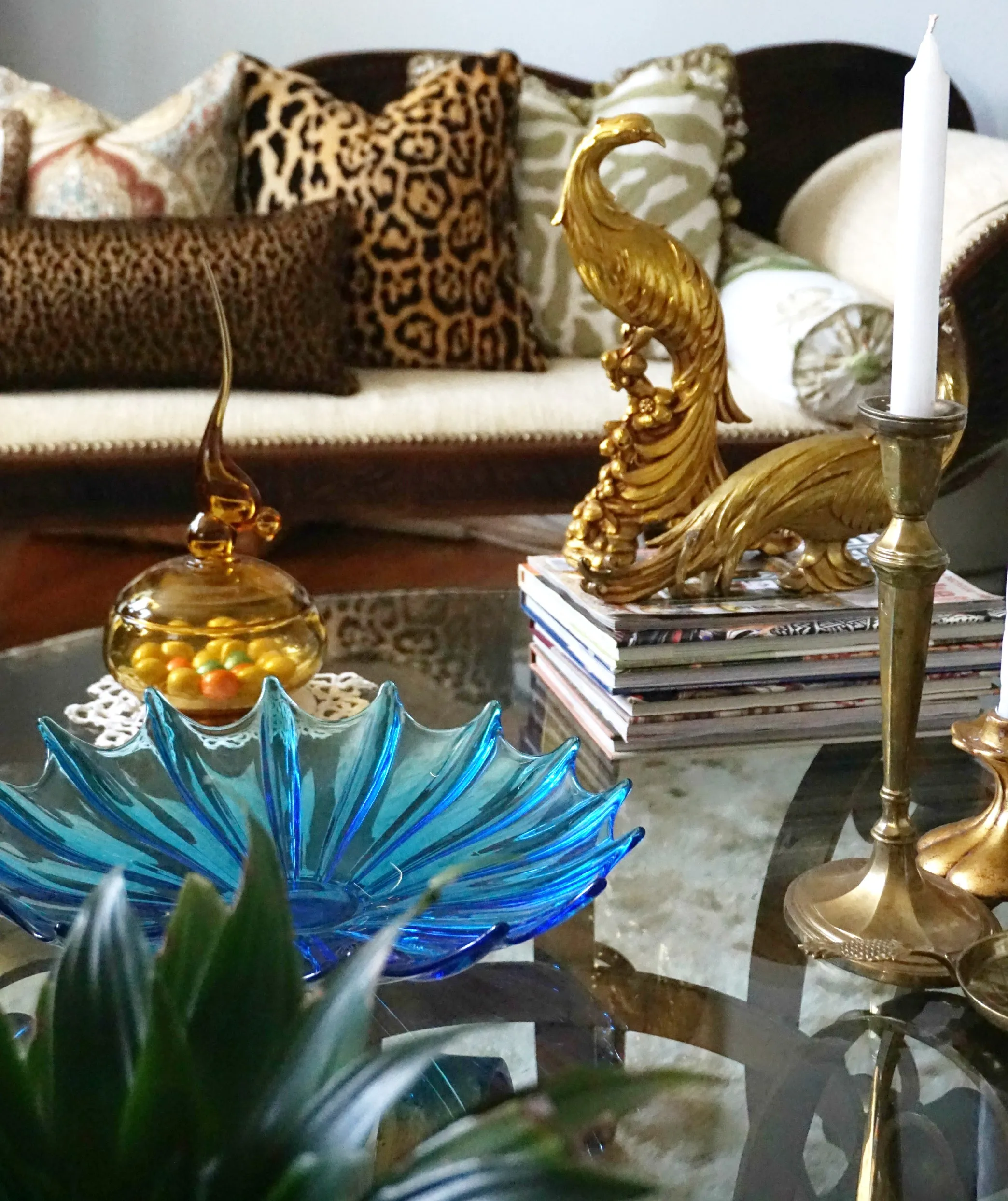 Colorful dishes adding a pop of color to a coffee table.