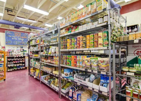 Colorful display of organic fruits and vegetables in the grocery section of Lifestyle Markets Cook Street