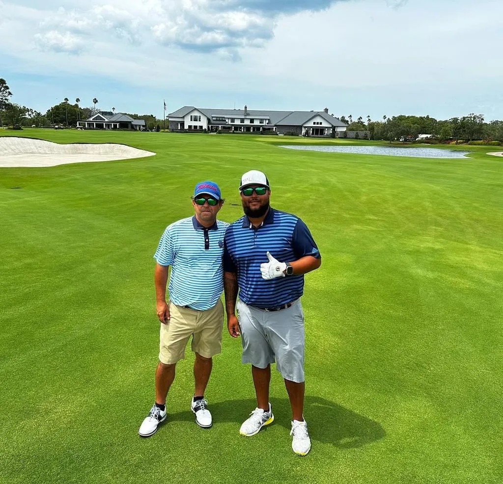 Connor Cruise, an enthusiastic golfer, at a golf course