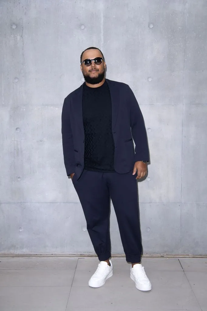 Connor Cruise attending the Emporio Armani show during Milan Fashion Week in 2023