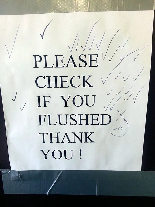 Coworkers marking calendar with humorous X's