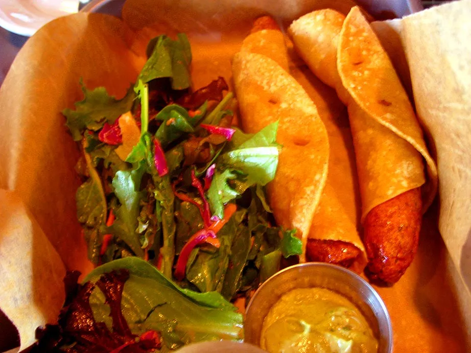 Crispy Dogs plated with sauce