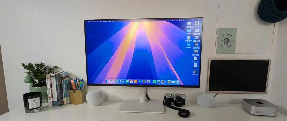 Dell 27 Plus 4K S2725QS on a desk with design software open