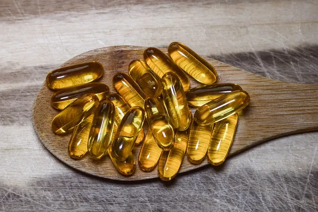 Dog happily eating a liver supplement