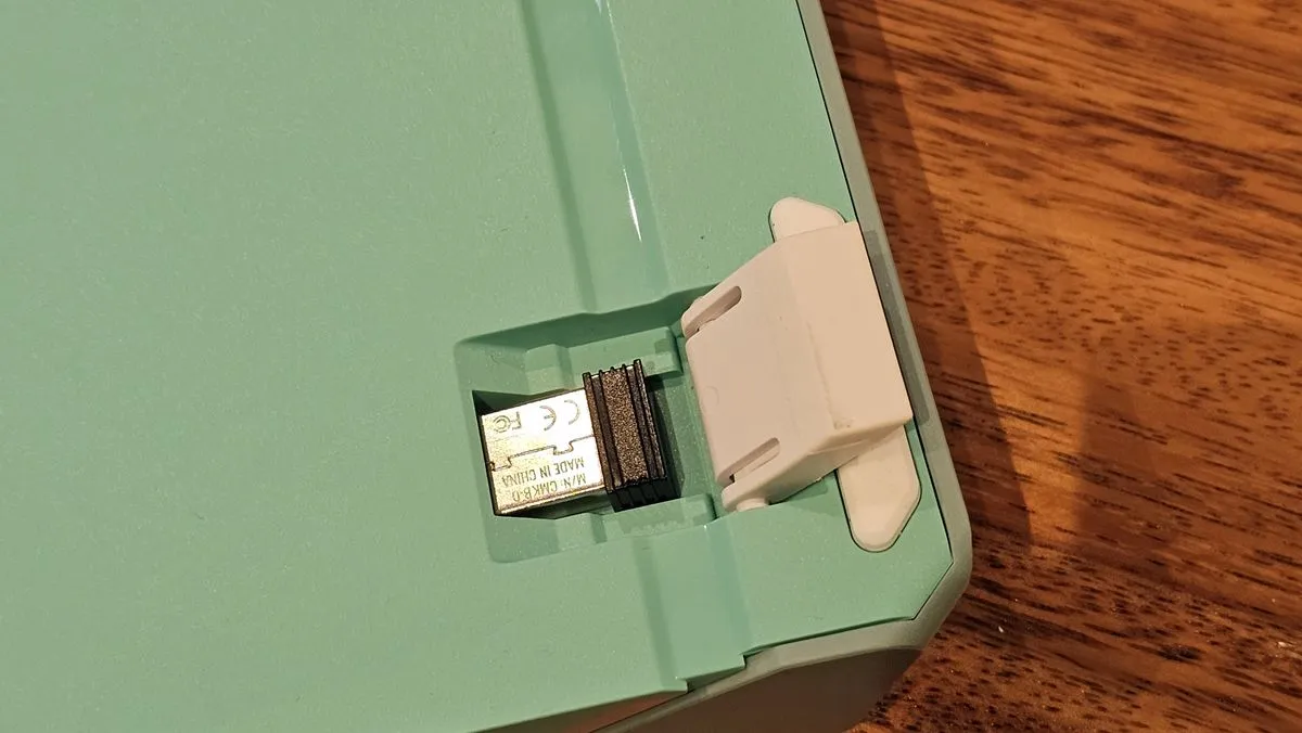 Dongle storage under feet on Cooler Master MK770