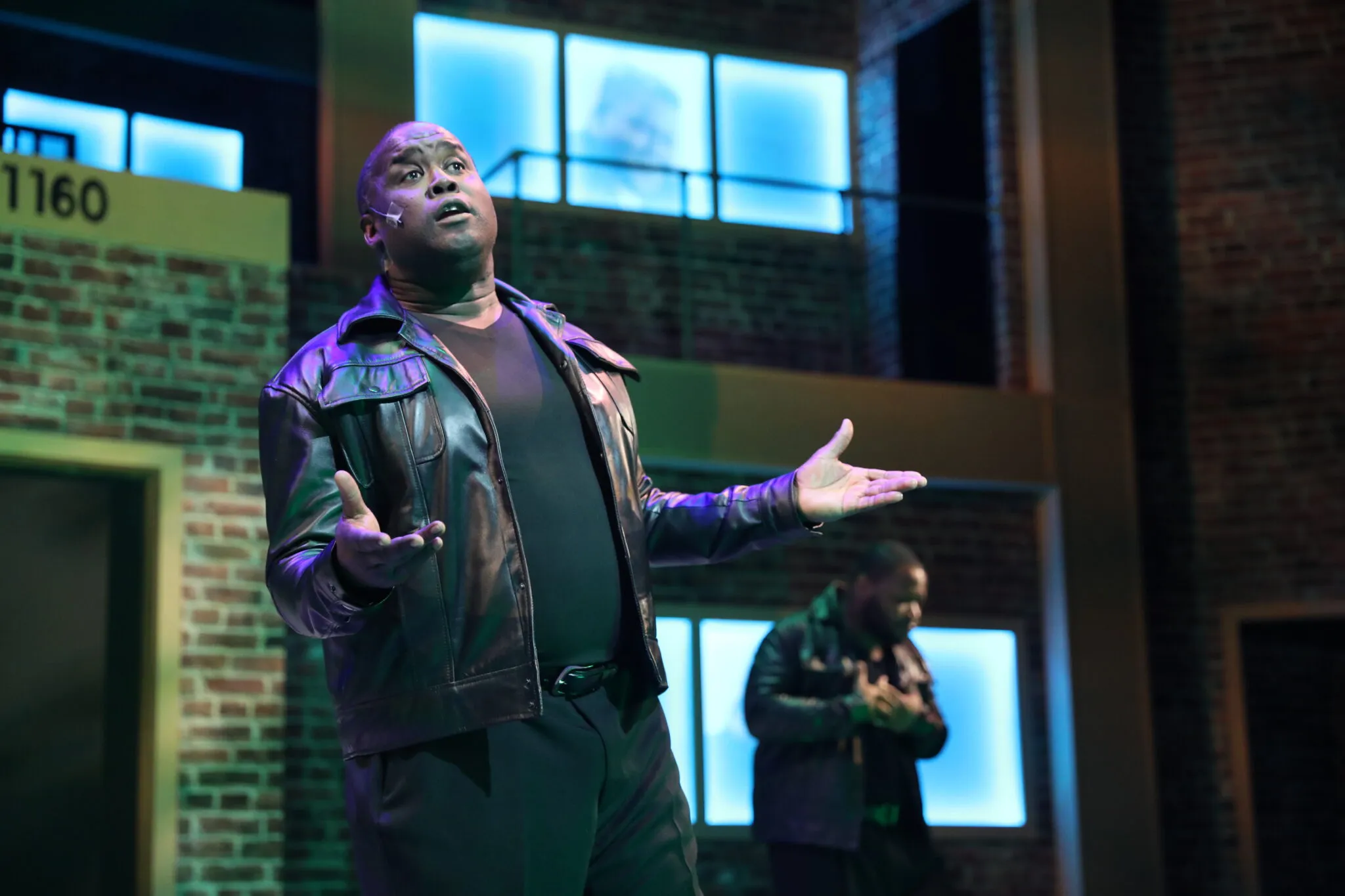 Dwight Neal performing a solo spotlight moment on stage
