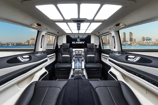 Dynamic side profile of a Mercedes-Benz V-Class V300 Luxury VIP First Class Van, showcasing its refined design.