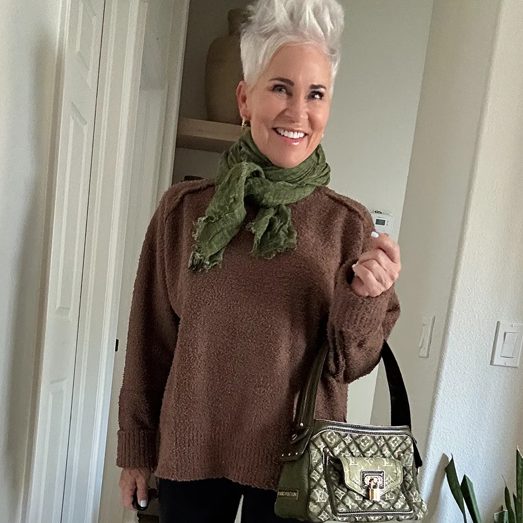 Eleanor Vance confidently wearing an oversized fashion ensemble