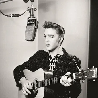 Elvis Presley in 1958, capturing his youthful energy and iconic style