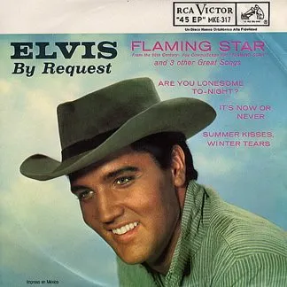 Elvis Presley in "Flaming Star", a western film where he played a mixed-race character torn between two worlds.