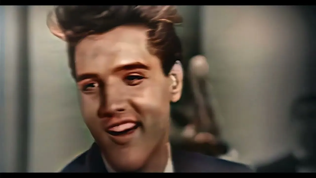 Elvis Presley performing live on stage