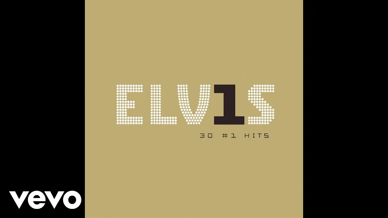 Elvis Presley performing onstage, radiating charisma and passion