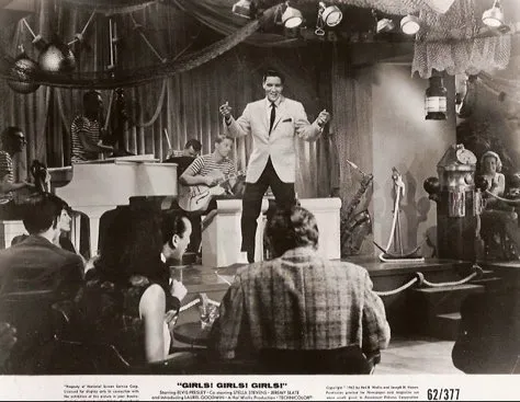 Elvis Presley performing "Return to Sender" in the movie Girls! Girls! Girls!