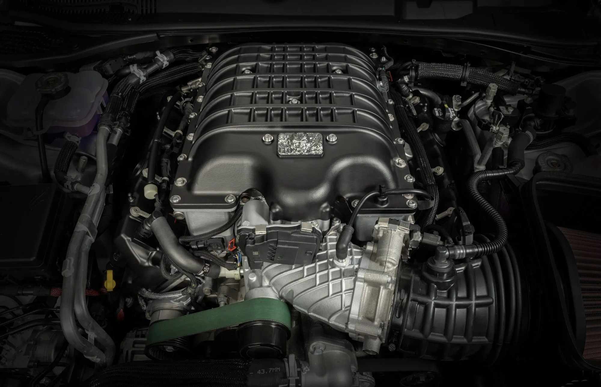 Engine components of 2023 Dodge Challenger SRT Demon 170 including supercharger and fuel system