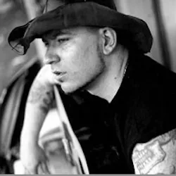 Everlast performing live with a guitar