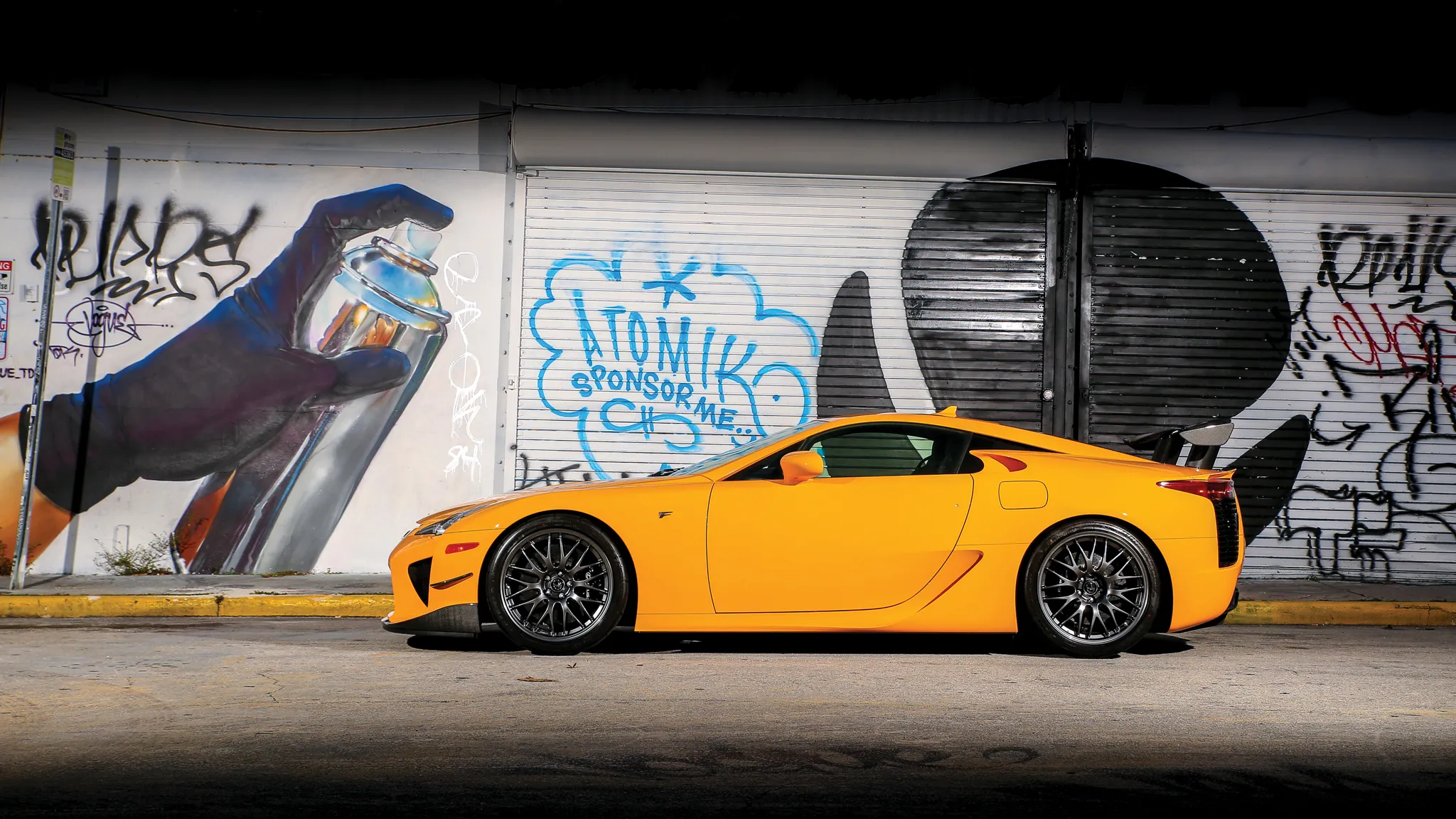 Front quarter view of a Lexus LFA Nürburgring Package in motion, showcasing its dynamic presence