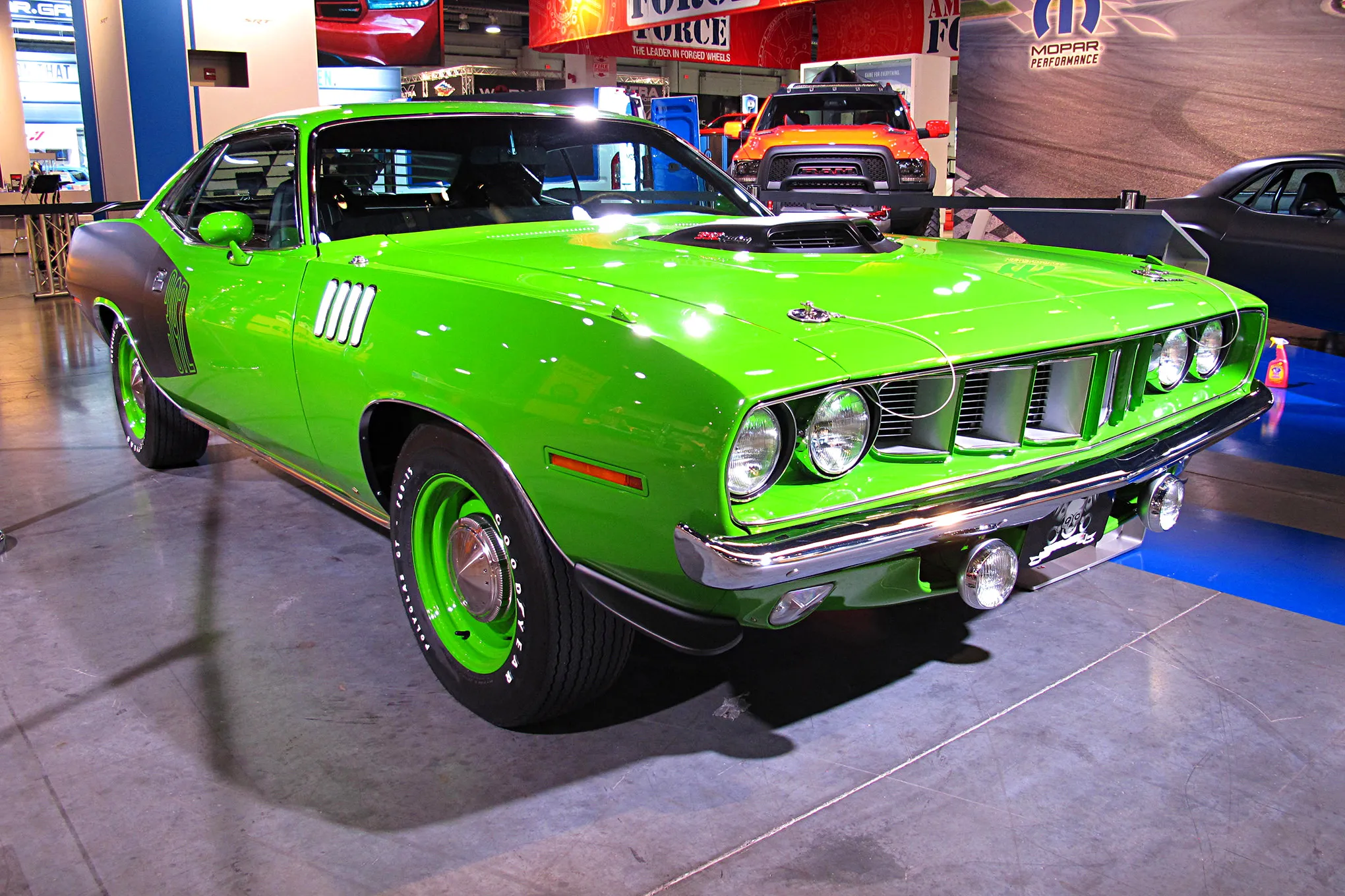 Front three-quarter view of the Graveyard Carz 1971 Plymouth Hemi 'Cuda, showcasing its vibrant Sassy Grass Green paint