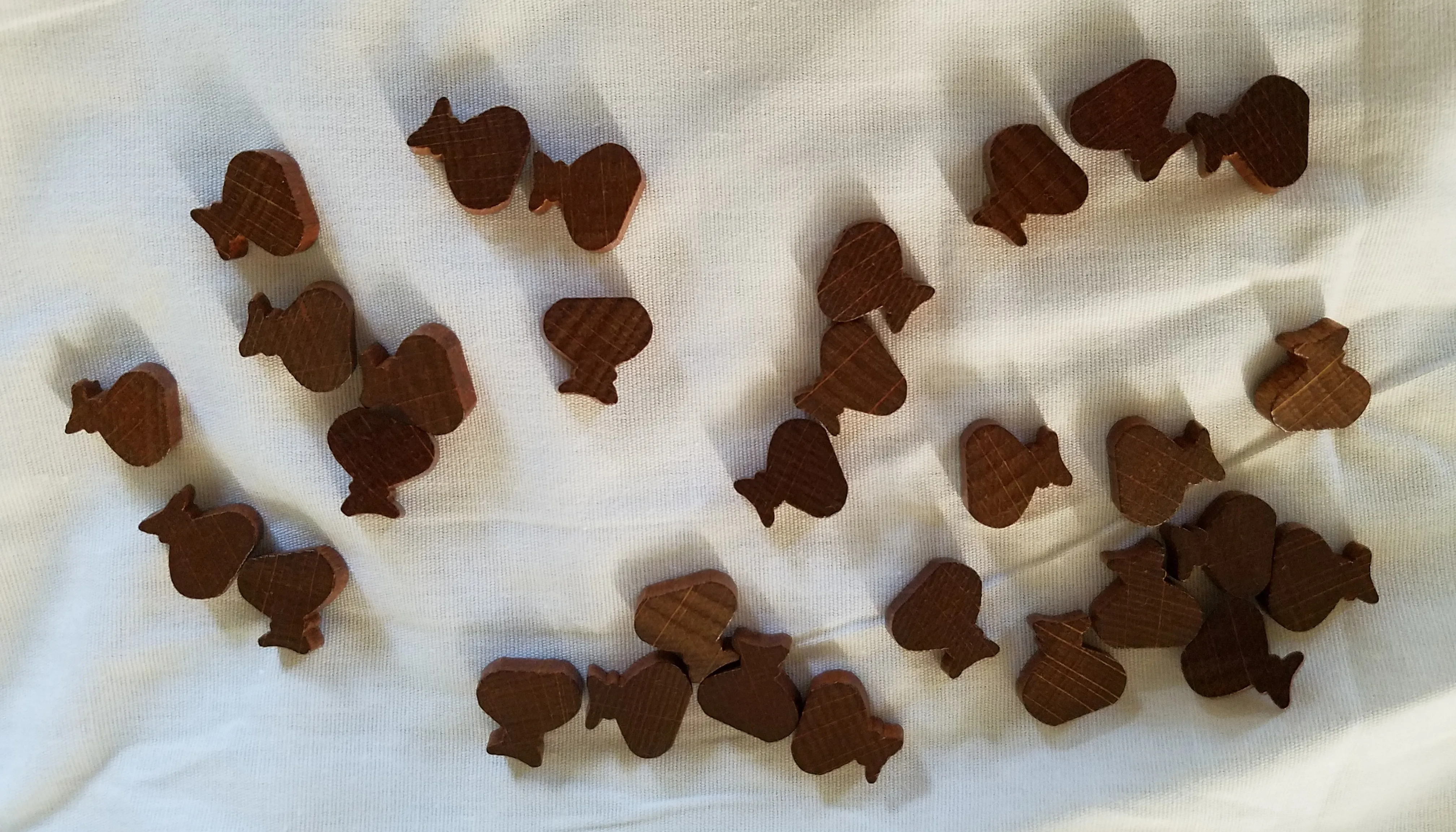 Game tokens representing strategic resources for complex gameplay