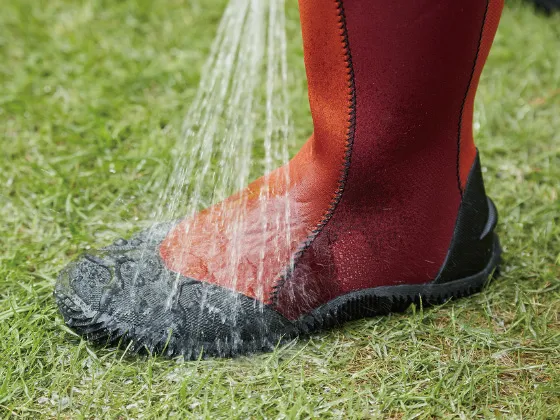 Green Master boots demonstrating waterproof upper material